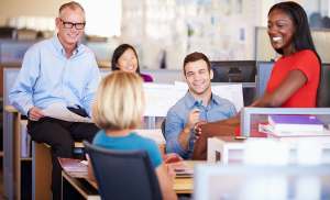 HR team discussing employee communications best practices