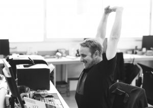 stretching and other tips for improving health and wellness at work